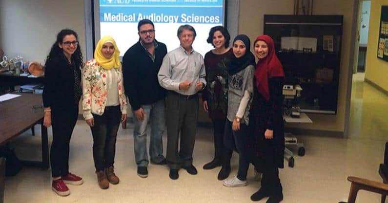 Photo of the first cohort of audiology students in the Medical Audiology Sciences program at the American University of Beirut with Visiting Professor James W. Hall III, PhD, during an auditory electrophysiology class in January of 2016.