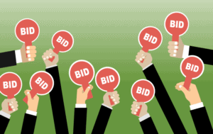 Illustration of diverse group of hands holding up bidding paddles