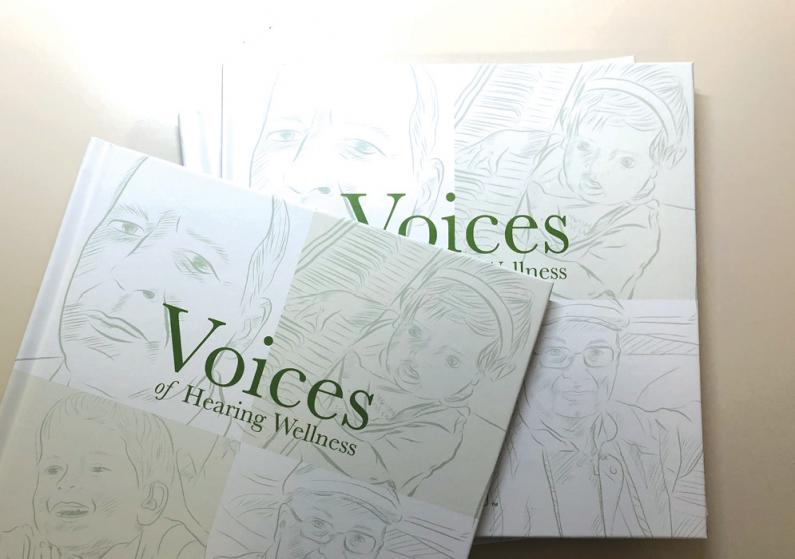 Photo of a group of Voices of Hearing Wellness books