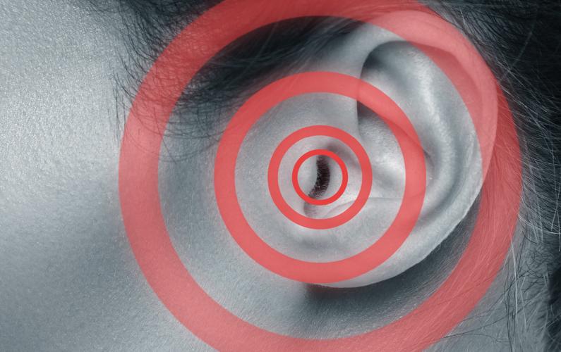 Close-up photo of an ear with tinnitus issues