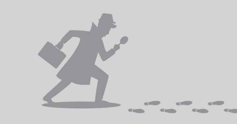 Illustration of detective holding briefcase and magnifying glass investigating foot prints