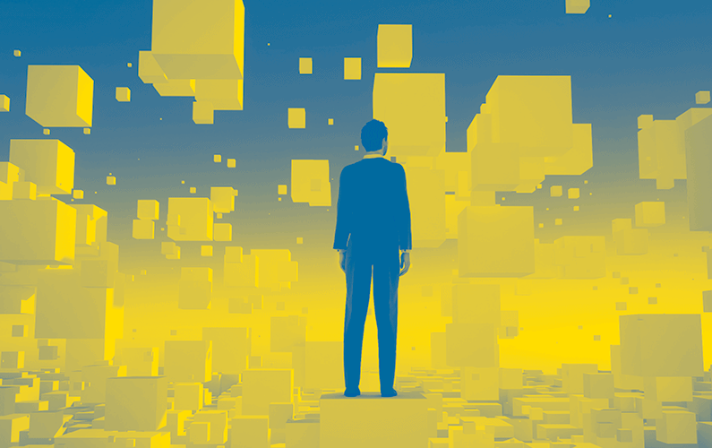 Photo illustration of business man standing on cube with floating cubes surrounding him