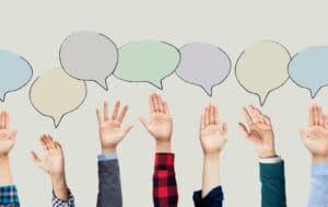 Combined photo of volunteering hands with illustrated speech bubbles overhead