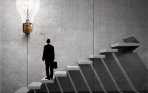 Abstract photo of business man looking up at an idea while standing on inclining staircase