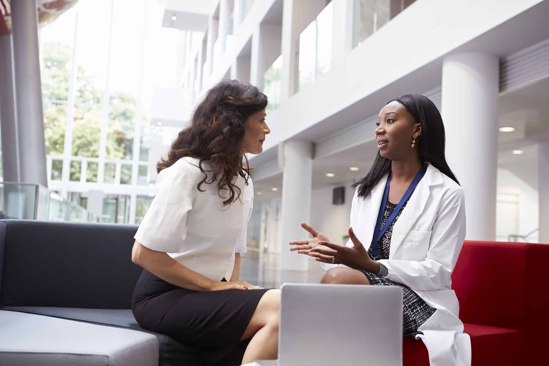 Female Colleagues Discussing