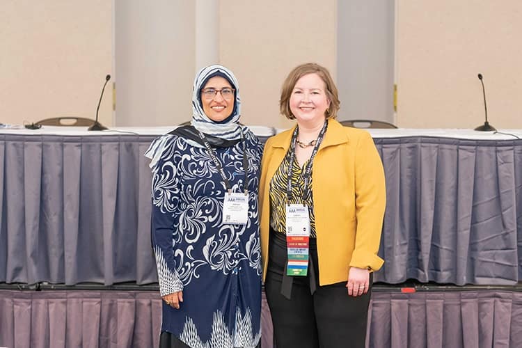 AAA 2022 Program Chair Wafaa Kaf, PhD, and Academy President Sarah Sydlowski, AuD, PhD, MBA