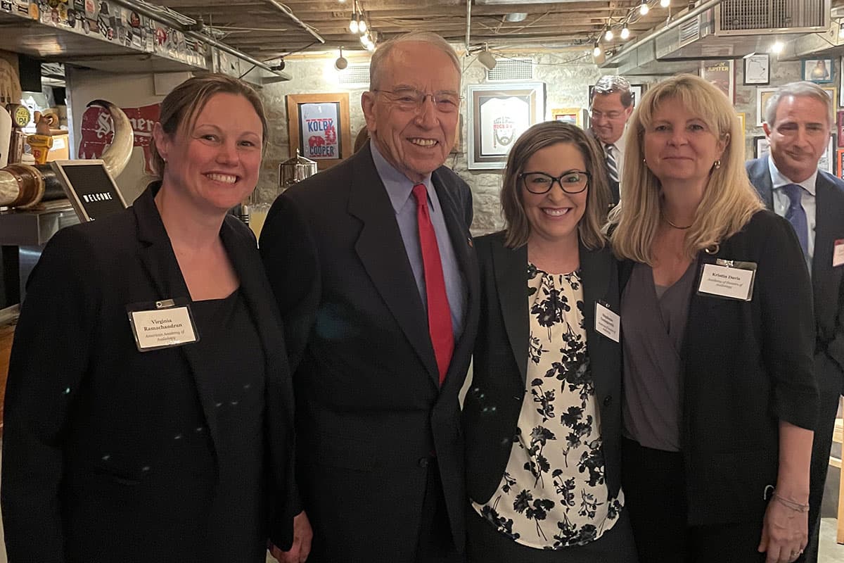 Academy President Virginia Ramachandran, AuD, PhD, with Senator Chuck Grassley, ADA Executive Director Stephanie Czuhajewski, and ADA Past President Kristin Davis, AuD