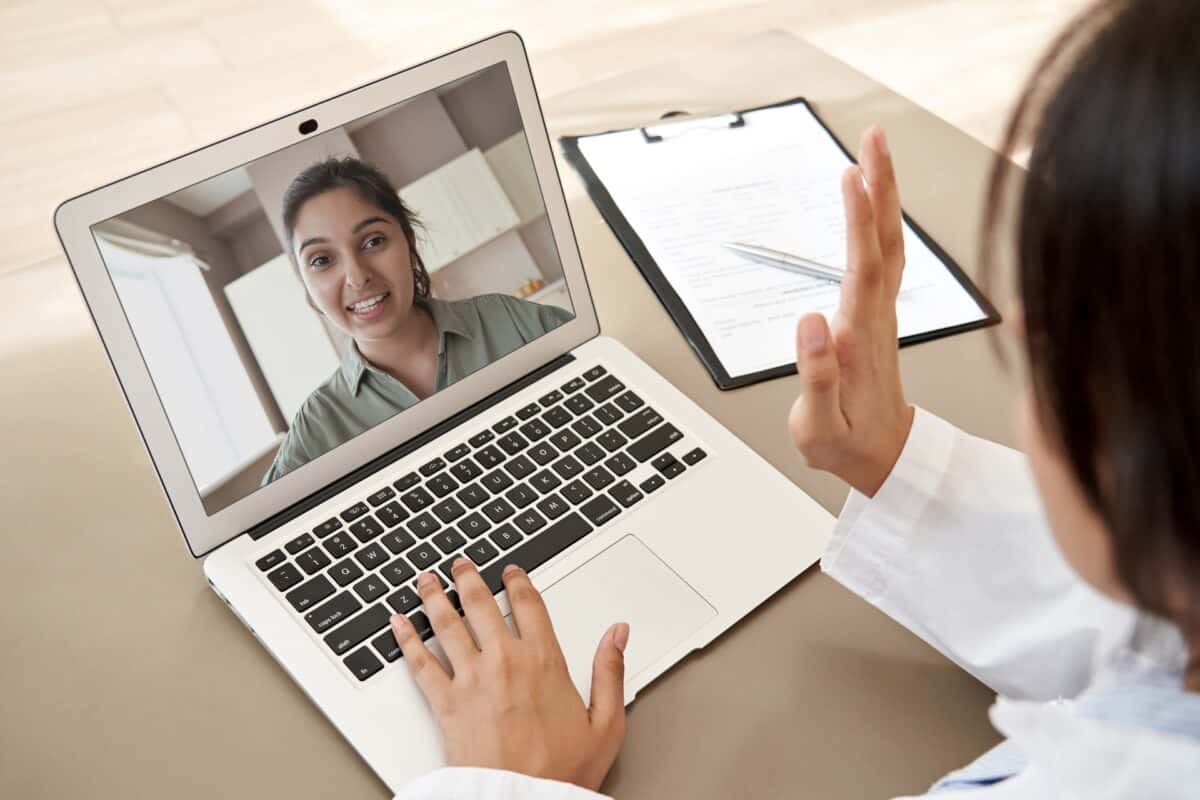 Telehealth female doctor and female patient.