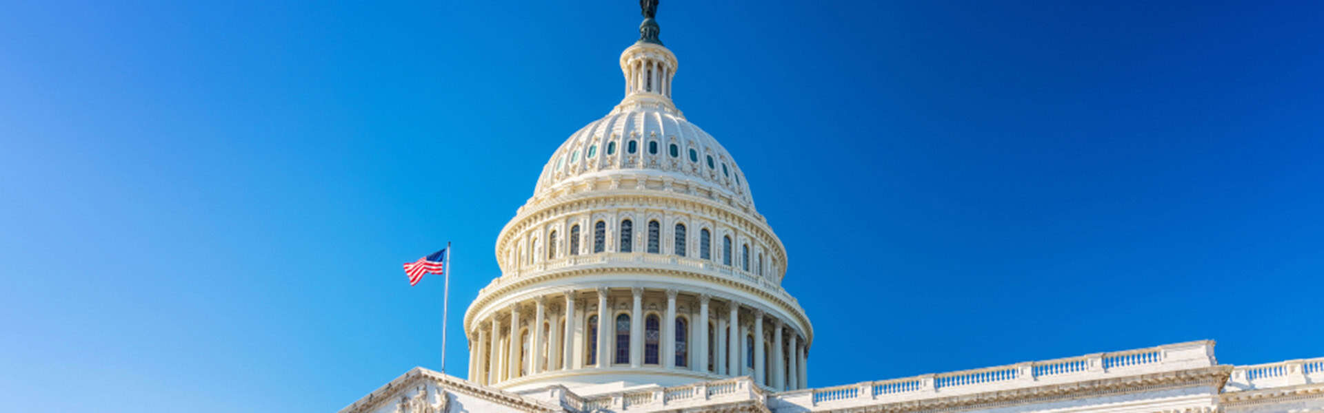 US Capitol over blue sky