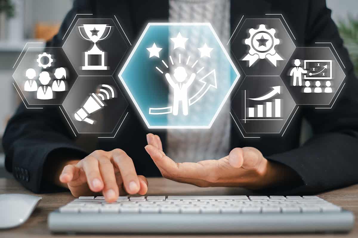 A,Business,Professional,Using,Digital,Tools,To,Boost,Employee,Motivation A business professional using digital tools to boost employee motivation and workplace productivity.