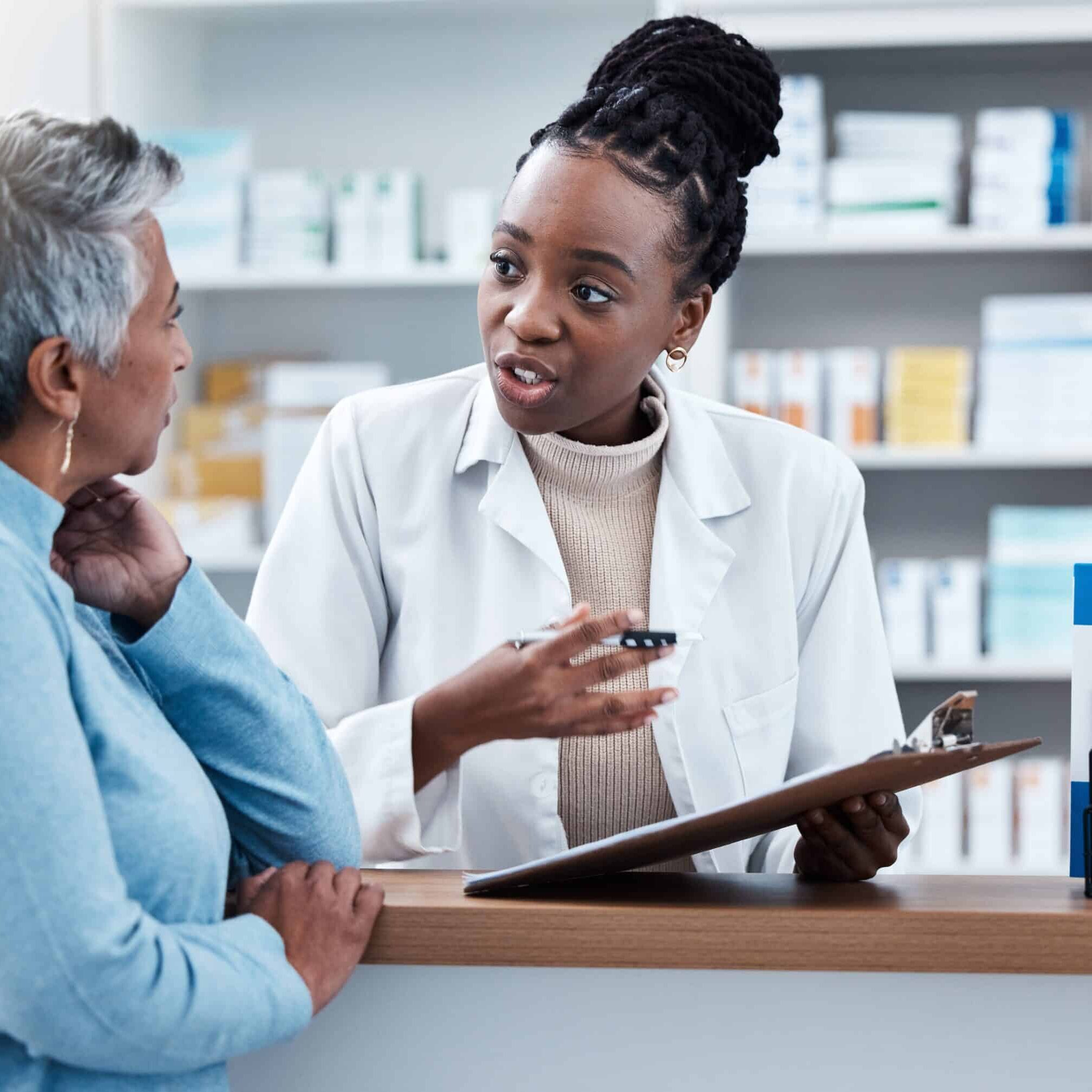 Pharmacy,,Medical,Or,Insurance,With,A,Customer,And,Black,Woman Pharmacy,,Medical,Or,Insurance,With,A,Customer,And,Black,Woman